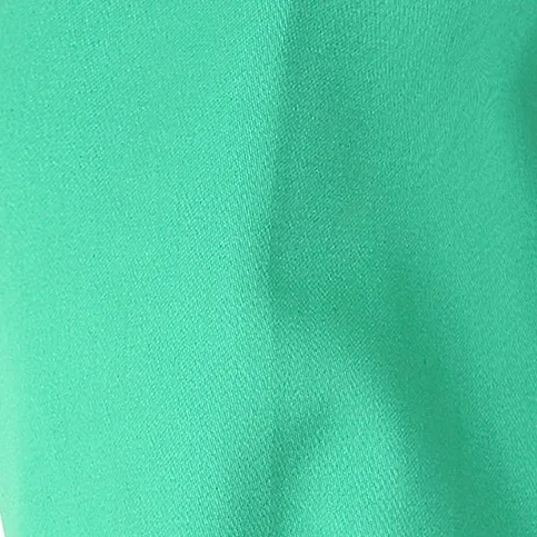 Green flame-resistant cotton fabric