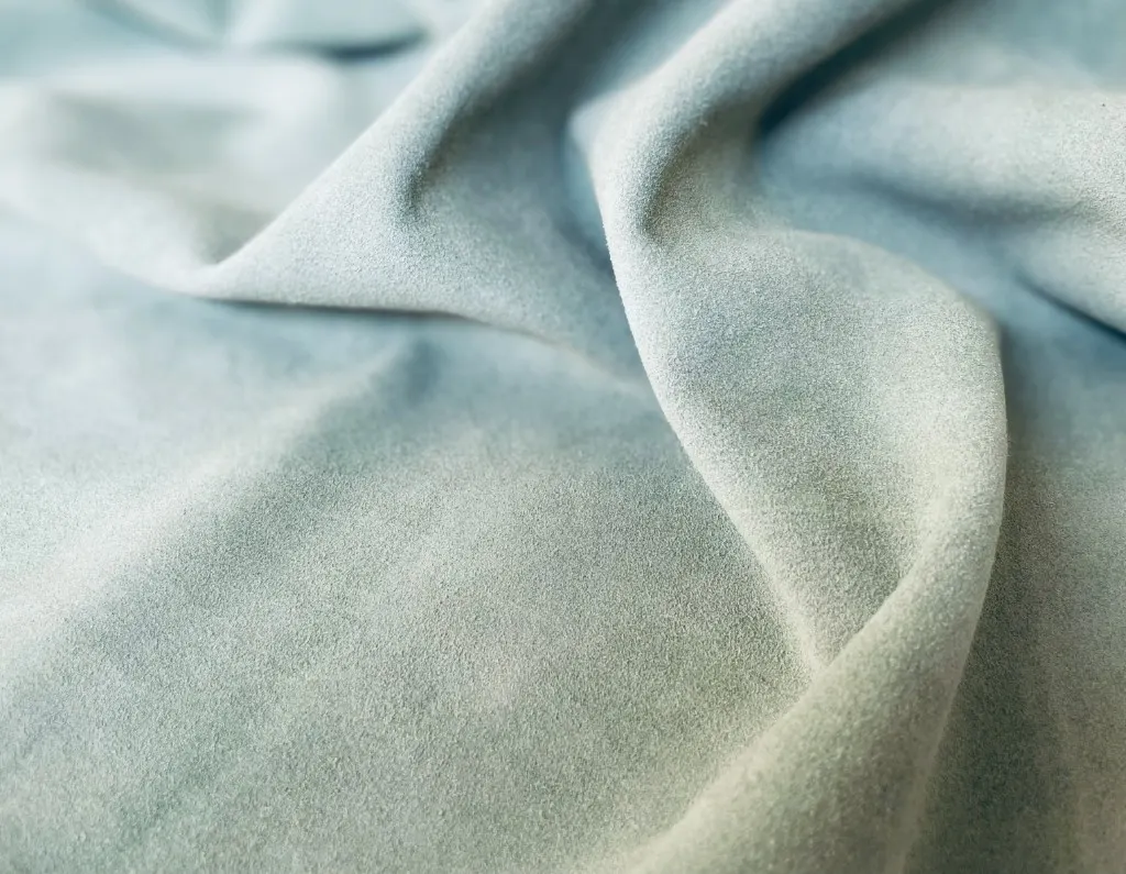 Pale blue finished leather with a soft nap